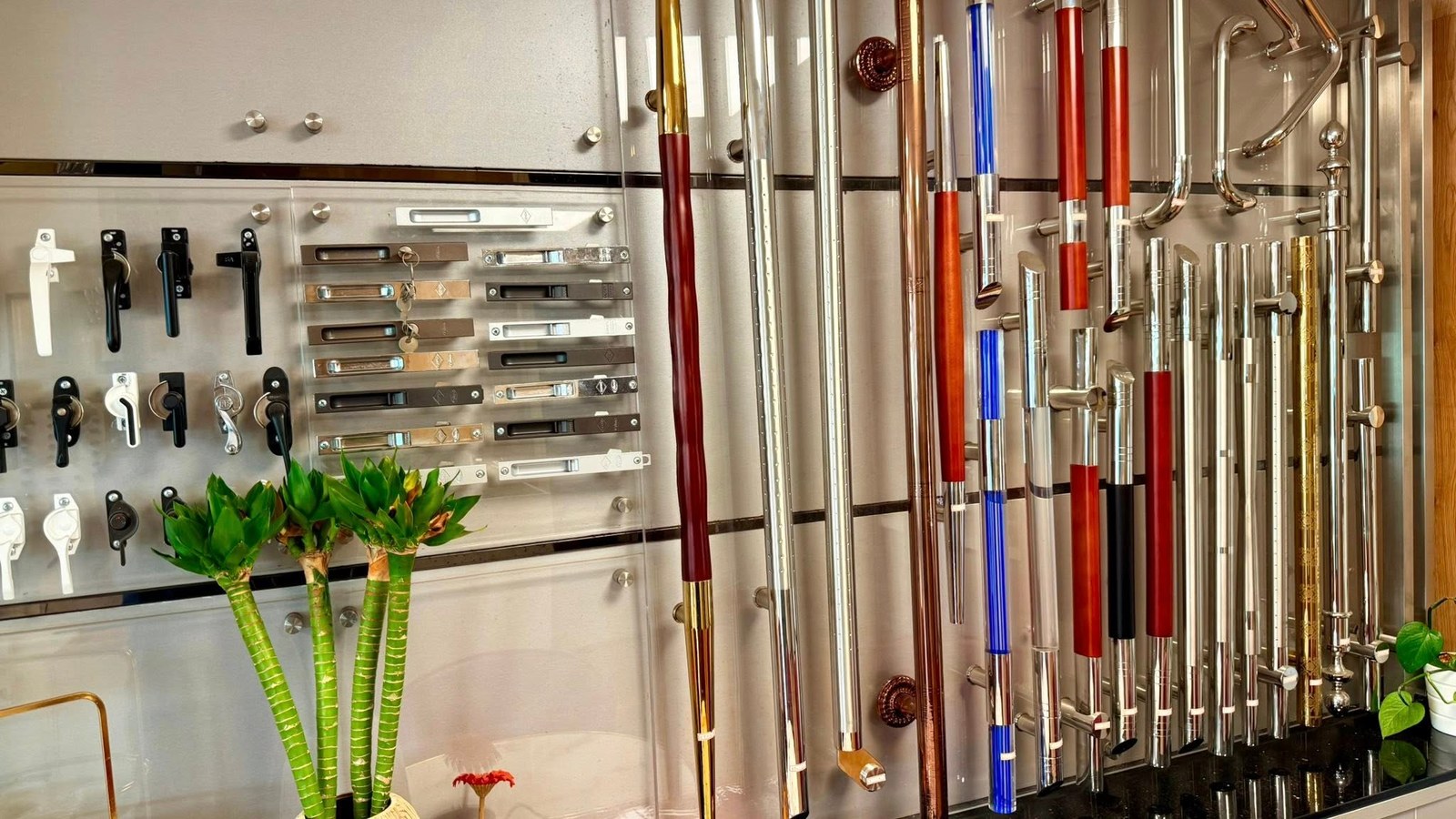 Wall of handles, pulls and window locks at LT-LIA showroom